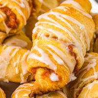 A crescent roll with crispy edges and stuffed with pumpkin filling.