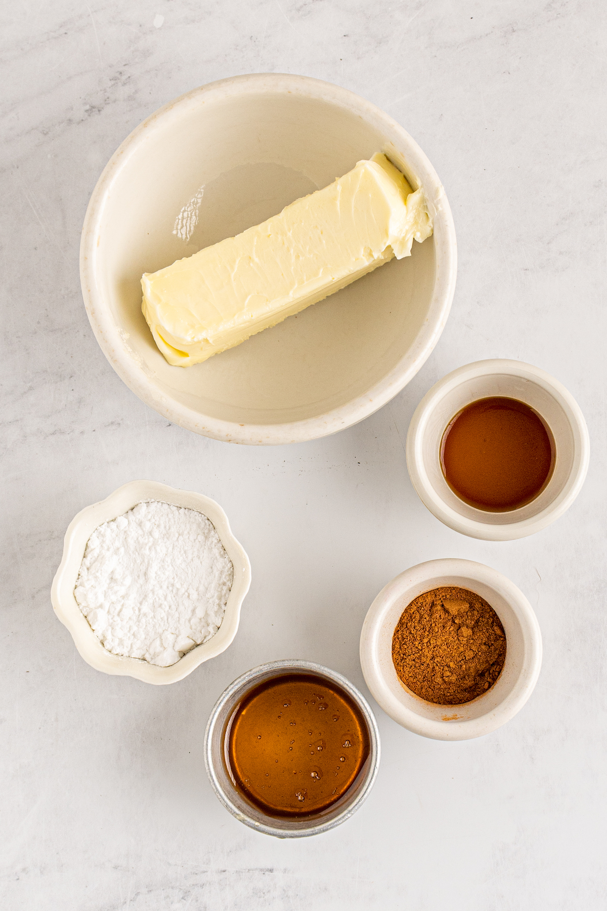 From top: Softened butter, vanilla, powdered sugar, honey, ground cinnamon.