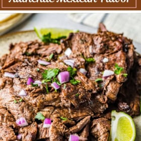 Steak carne asada on a plate with onion and cilantro.