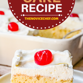 Tres leches cake with whip cream and a cherry on top.