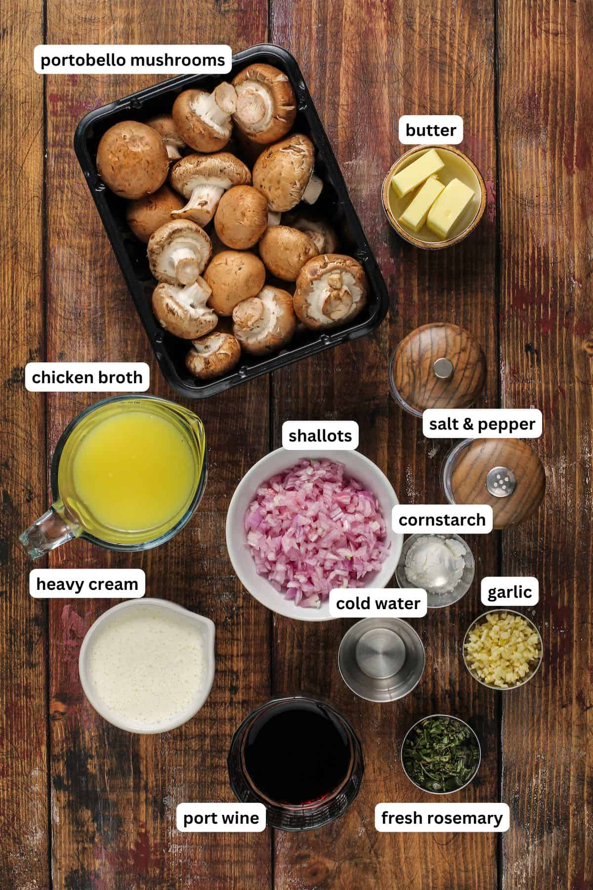 Ingredients for mushroom sauce recipe in order from top to bottom: portobello mushrooms, butter, chicken broth, shallots, salt and pepper, heavy cream, cold water, cornstarch, garlic, port wine, fresh rosemary.