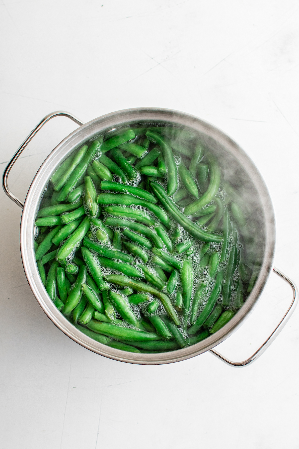 Green beans in boiling water.