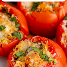 Tomato stuffed with cheese and breadcrumbs topped with minced fresh basil.
