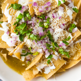 Homemade Chilaquiles Verdes on a white plate.