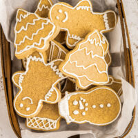 Christmas cut-out sugar cookies in a wax-paper lined basket.