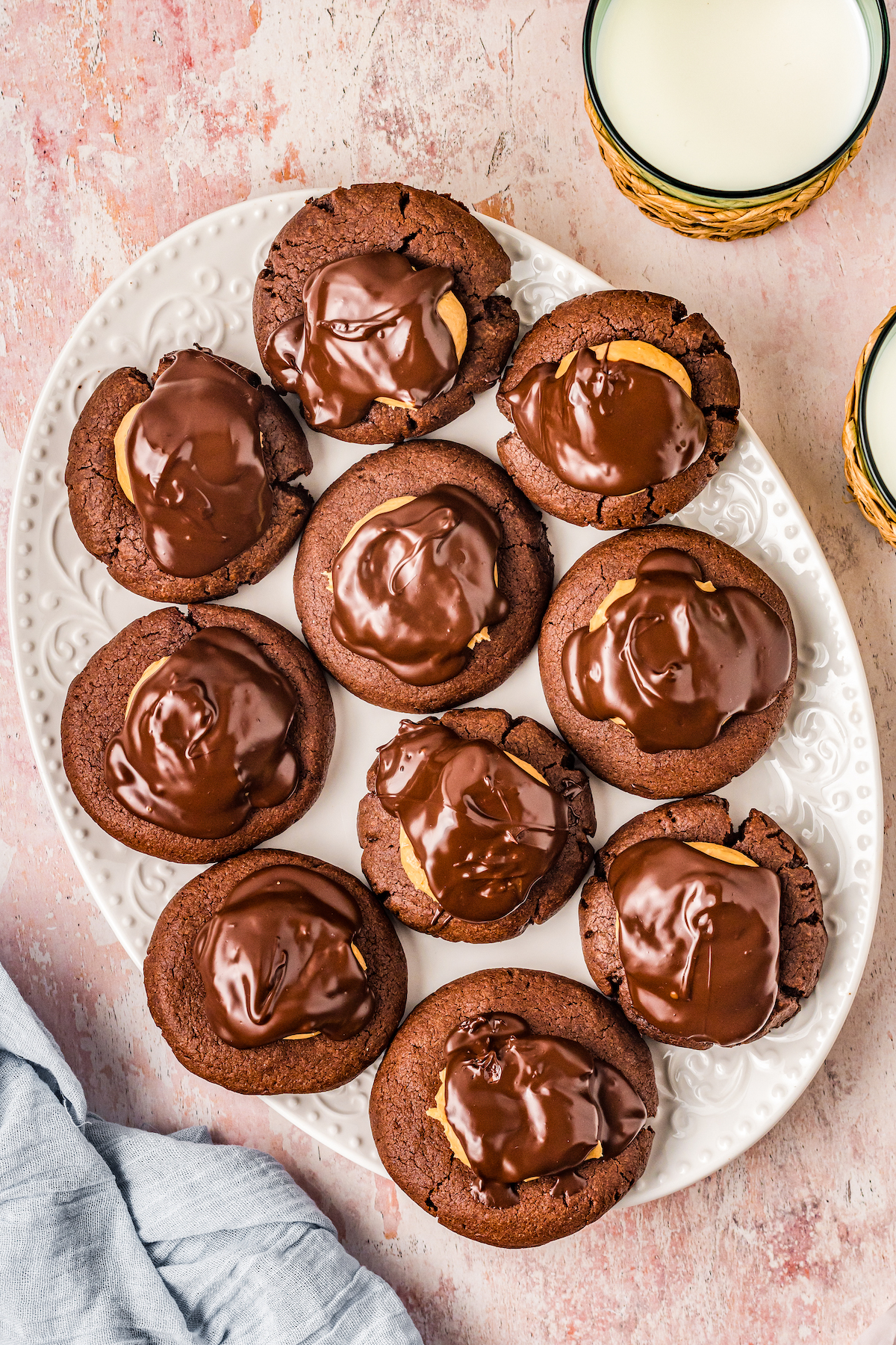 Overhead shot of ten brownie cookies on a platter.