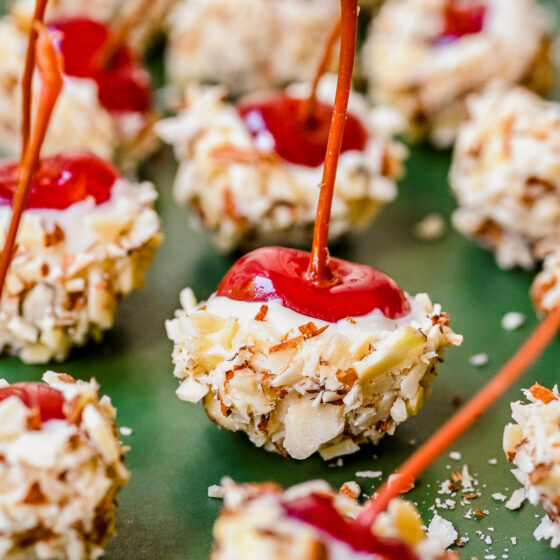Drunken cherries dipped in white chocolate and almonds.