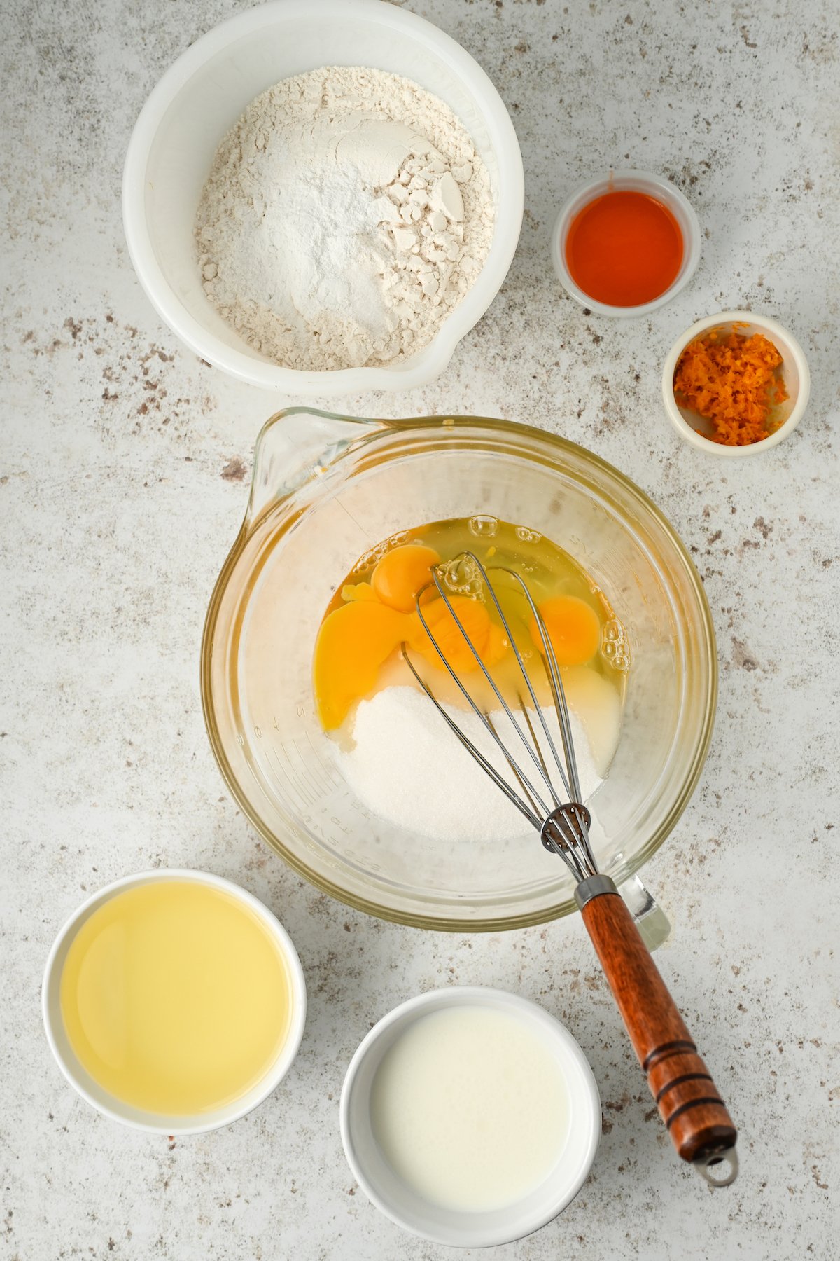 Mixing the wet ingredients in a bowl.