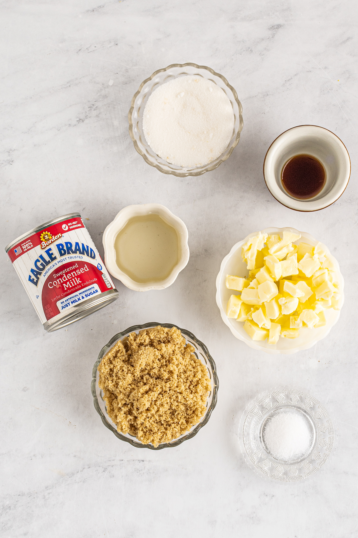 From top: Sugar, vanilla, sweetened condensed milk, butter, brown sugar, salt.