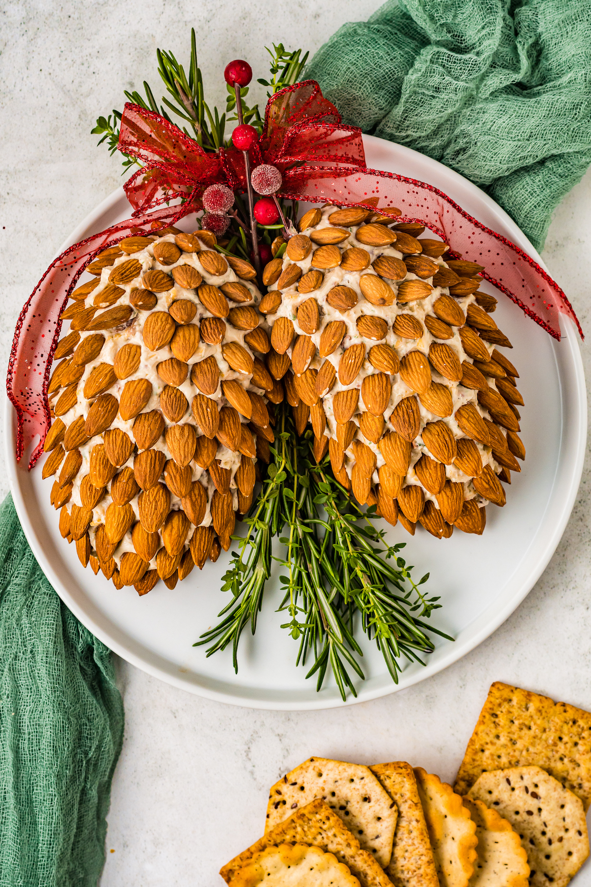 Pine cone cheese ball recipe, made with whole almonds and herbs.