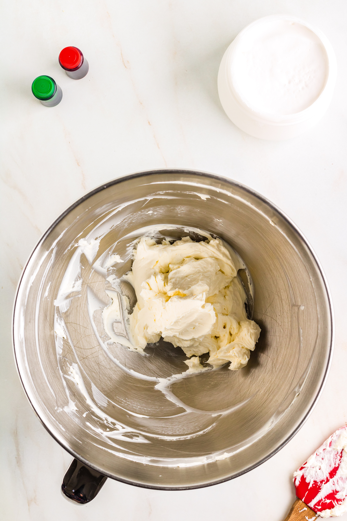Whipped cream cheese in a mixing bowl.