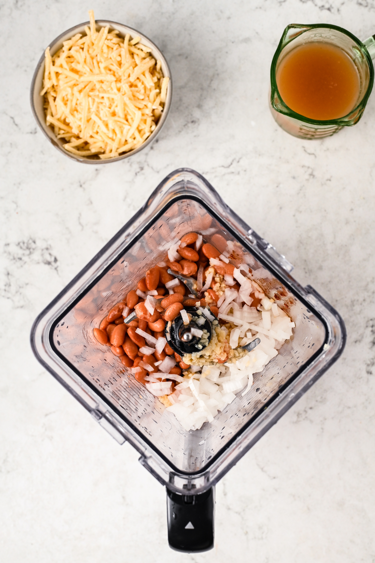 Beans, onion, garlic, chipotle, and salt in the blender.