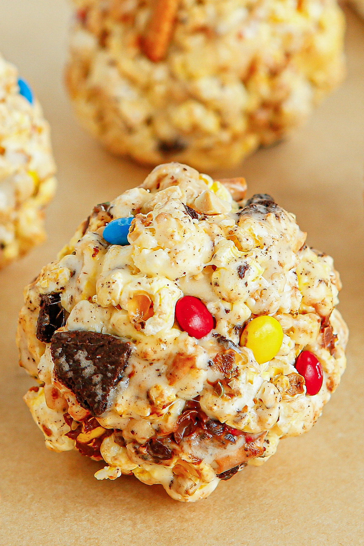 Close-up shot of a popcorn treat with mini M&Ms and other ingredients.