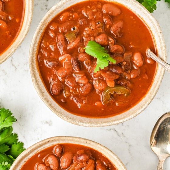 Bowls of ranch-style beans topped with cilantro.