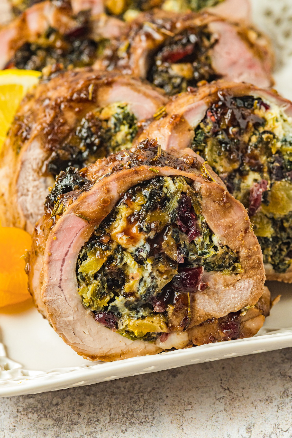 Close-up of sliced stuffed pork loin.