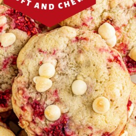 Up close image of raspberry white chocolate chip cookies stacked on top of each other.