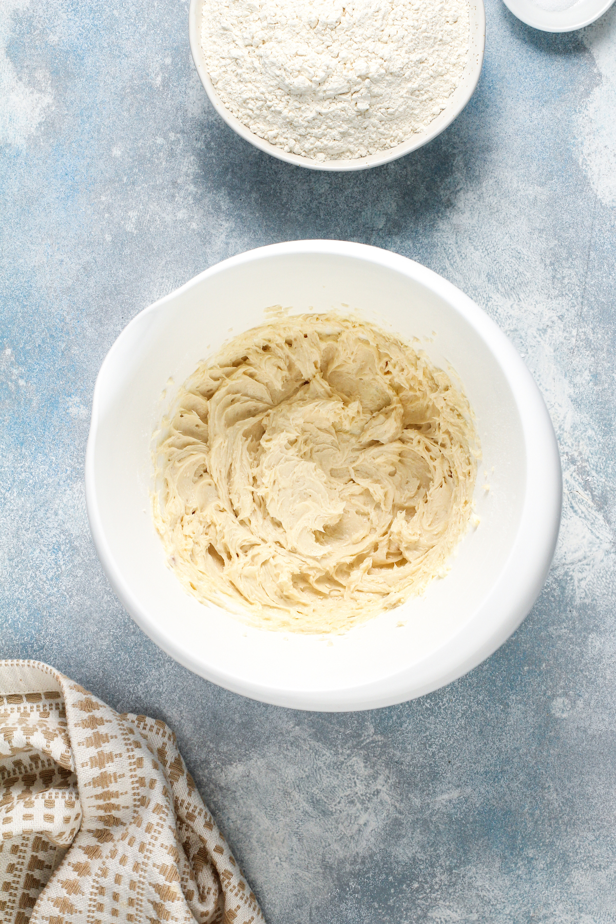 A bowl of butter and sugars whipped together.