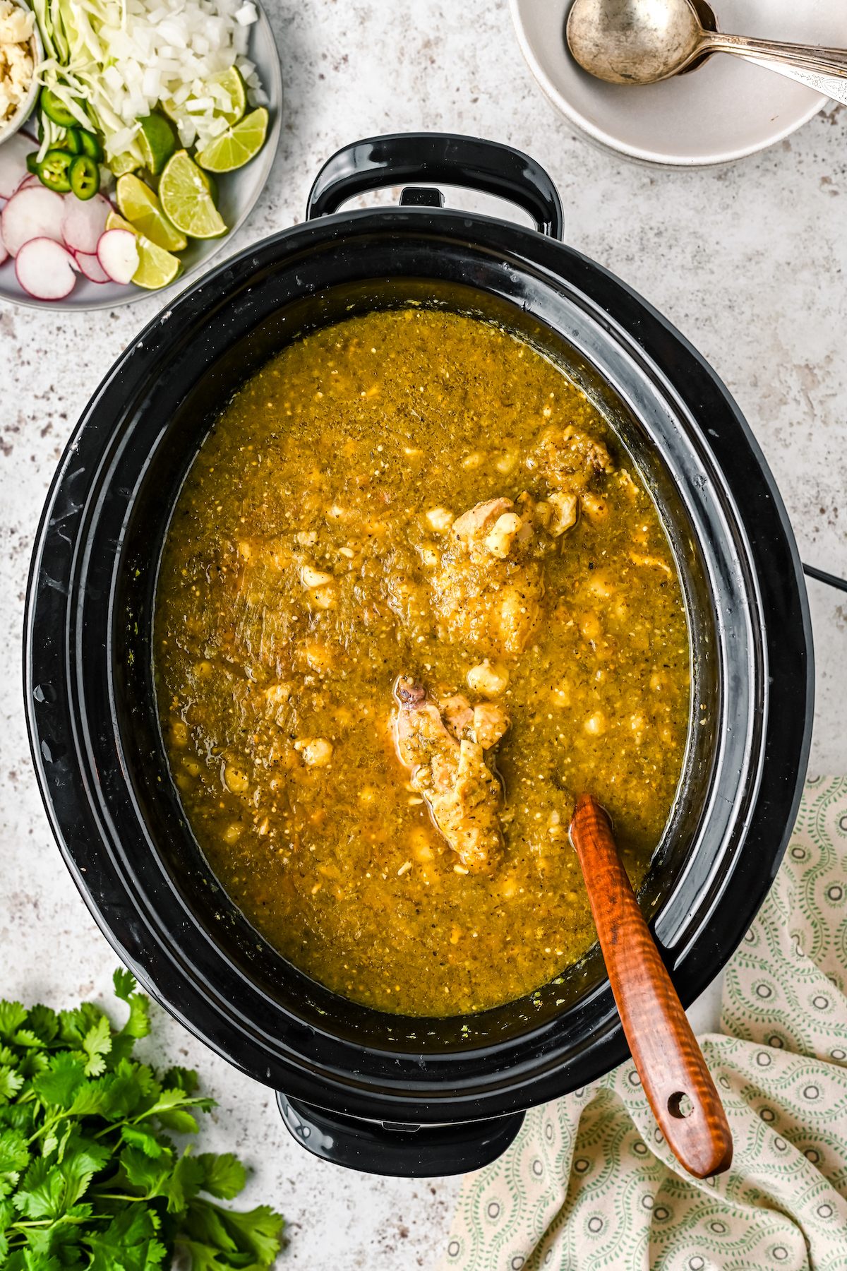 Cooked pozole in the crockpot without toppings.