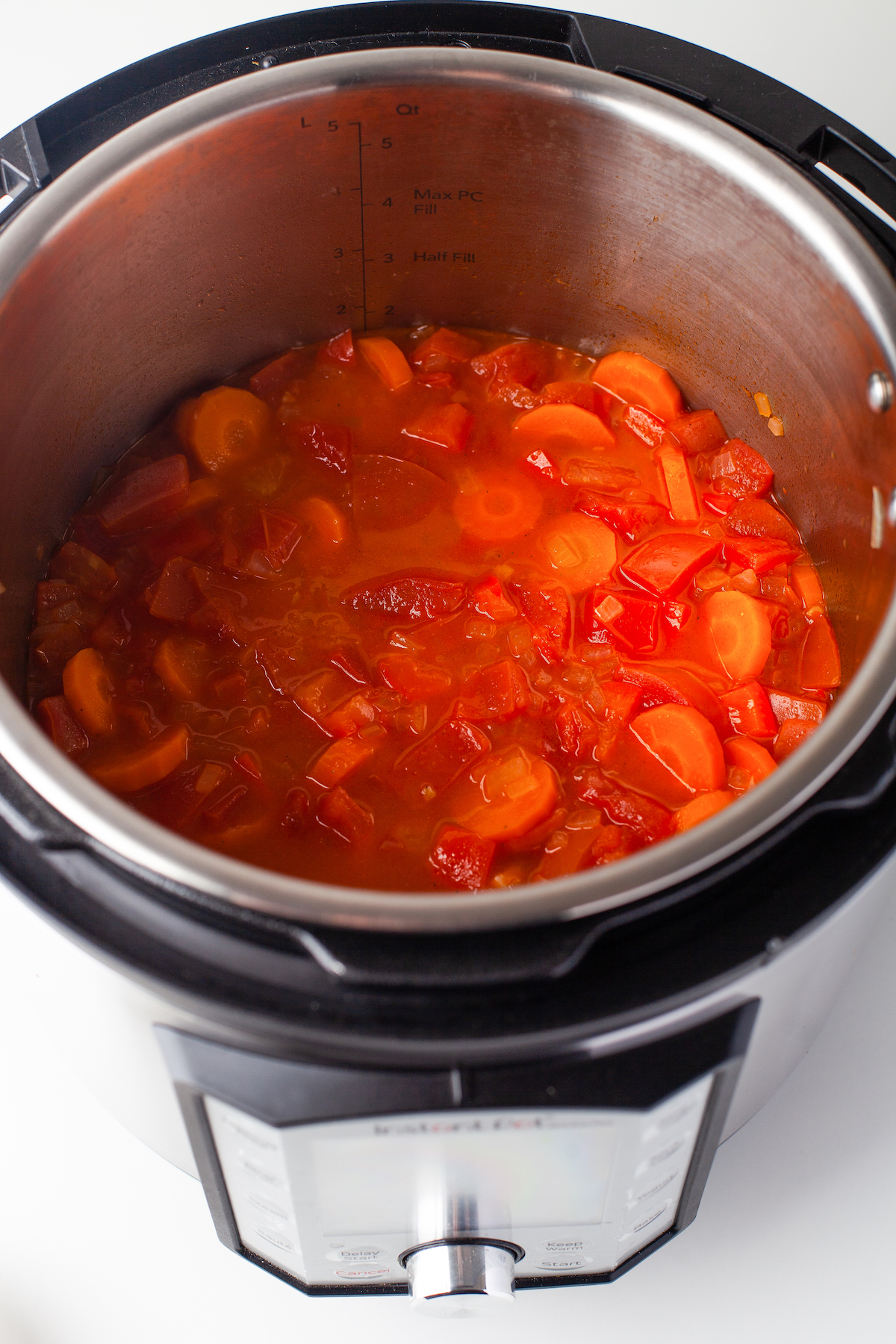 Cooked tomatoes and other ingredients in an Instant Pot.
