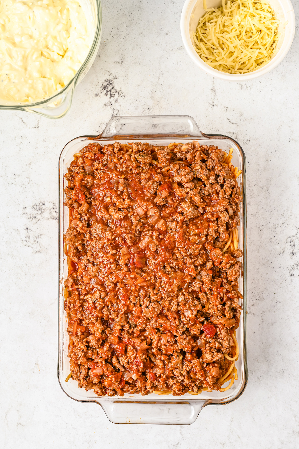 Meat sauce in a baking dish.