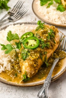 Easy salsa verde chicken on a plate with white rice.