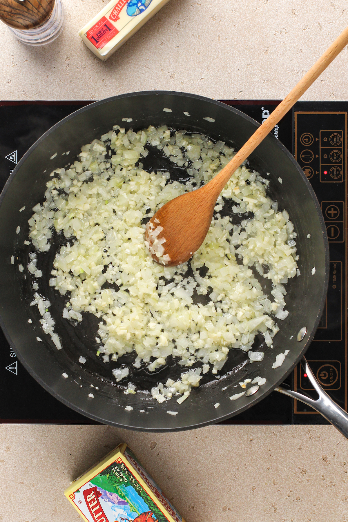 Sautéed onion and garlic in a saute pan.
