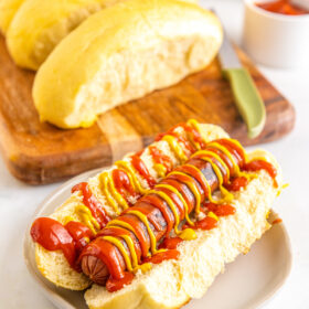 A hot dog with mustard and ketchup.
