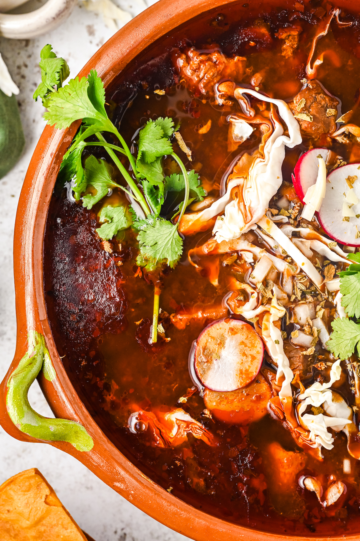 Close-up of red pozole.