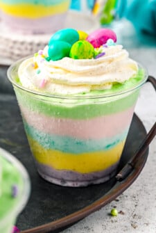 A pastel layered Jello parfait topped with Easter candy.