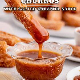 Homemade churro being dunked into a bowl of caramel sauce.
