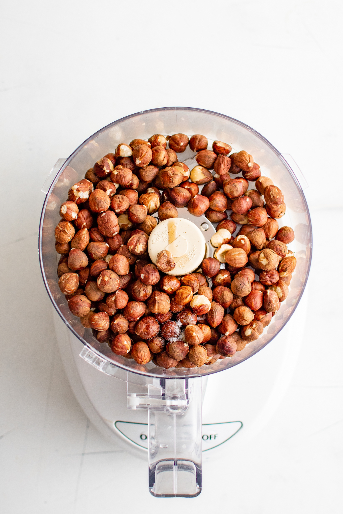Hazelnuts in a food processor.