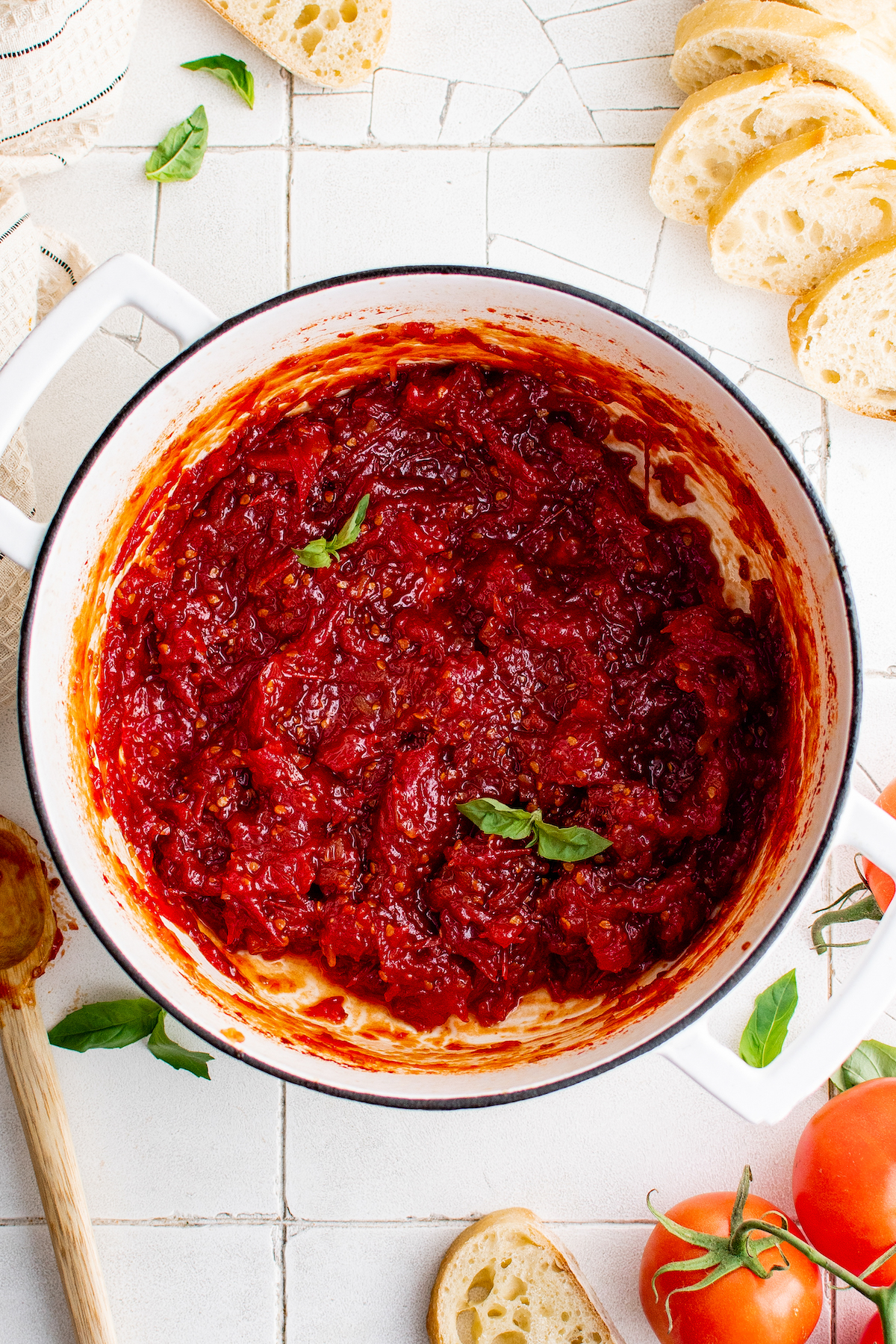 Slow-simmered tomato jam in a pot.