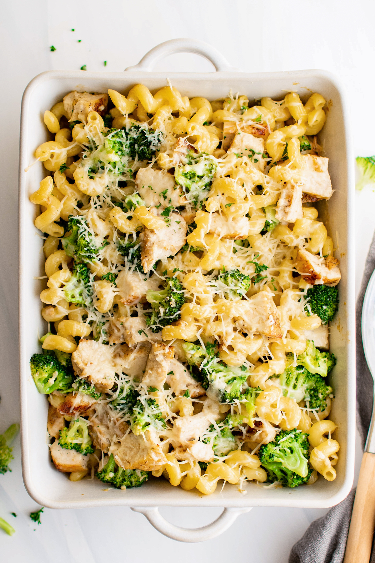 Chicken broccoli alfredo bake in a baking dish. 