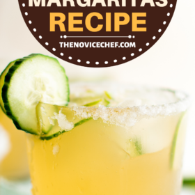 Cucumber margarita on the rocks with a salted rim.