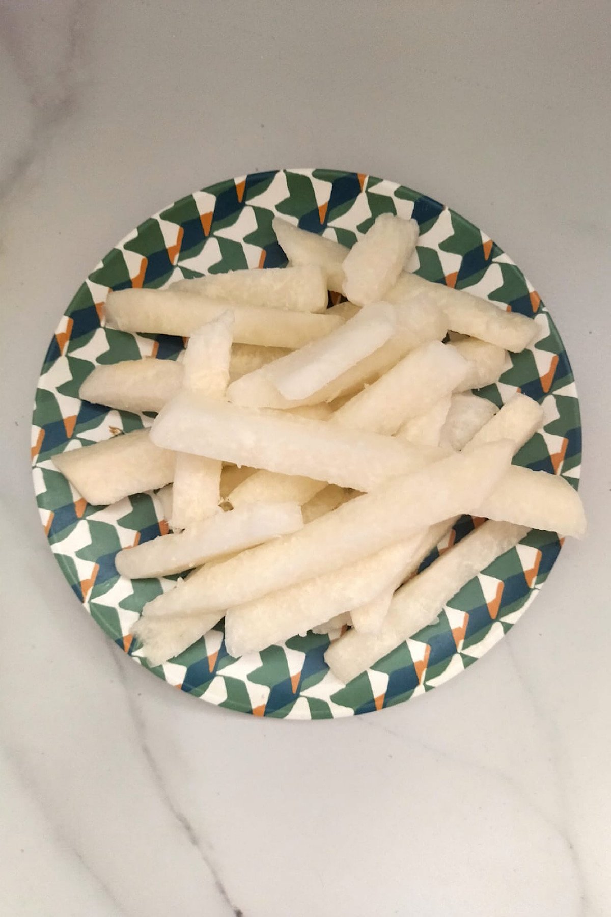 Sliced jicama on a plate.