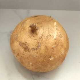 Whole unpeeled jicama.