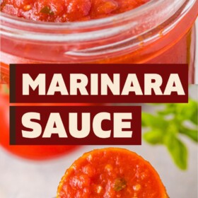 A jar of marinara sauce and a wooden spoon scooping up a serving of sauce.