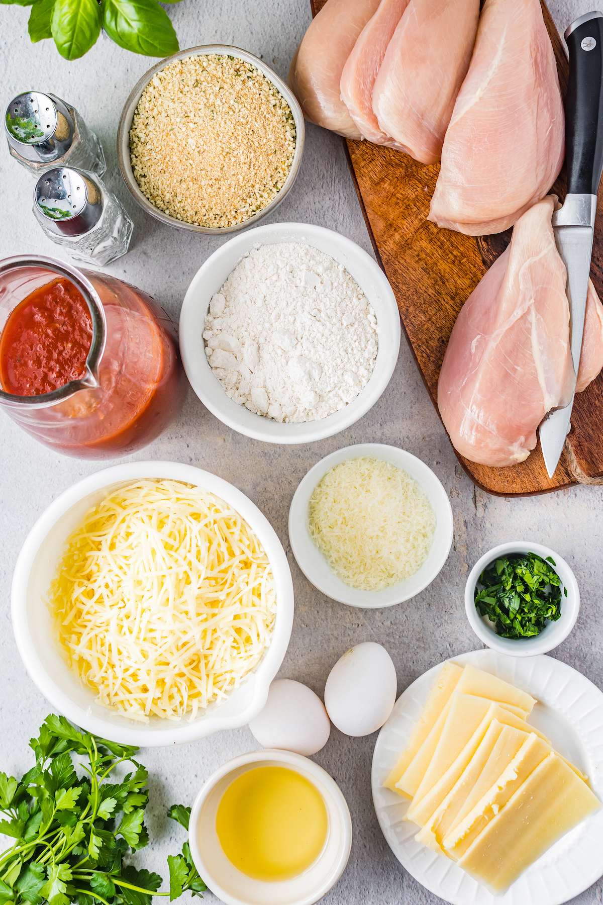 Ingredients for chicken parmesan.