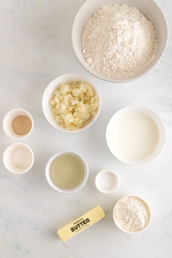 Mashed potatoes and other baking ingredients on a table.