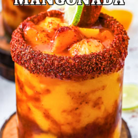 Mangonada drink on a wood coaster.