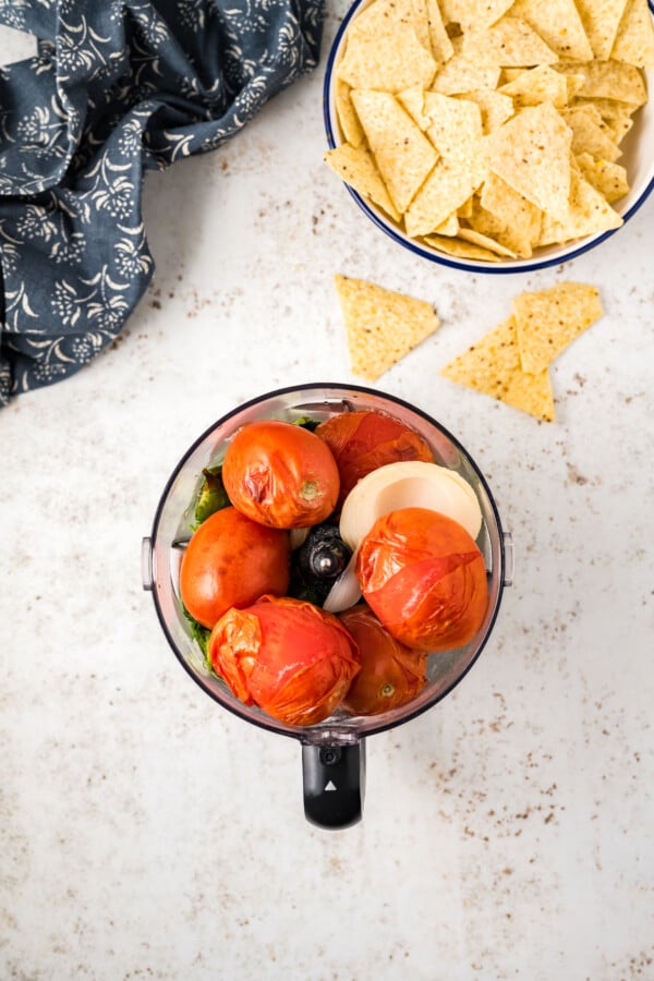 Adding the veggies to the blender. 