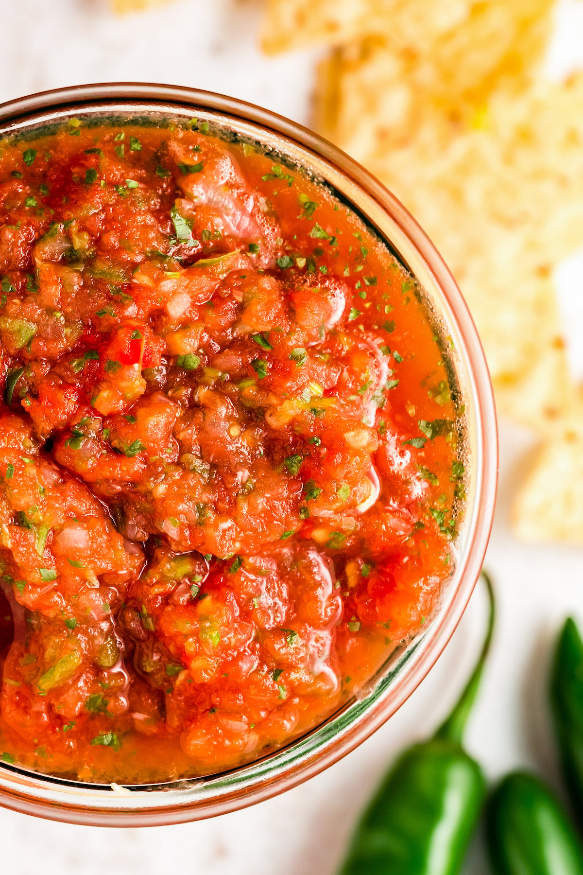 Angled shot of restaurant-style salsa in a bowl. 