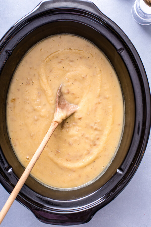 Blended potato leek soup in a crockpot.