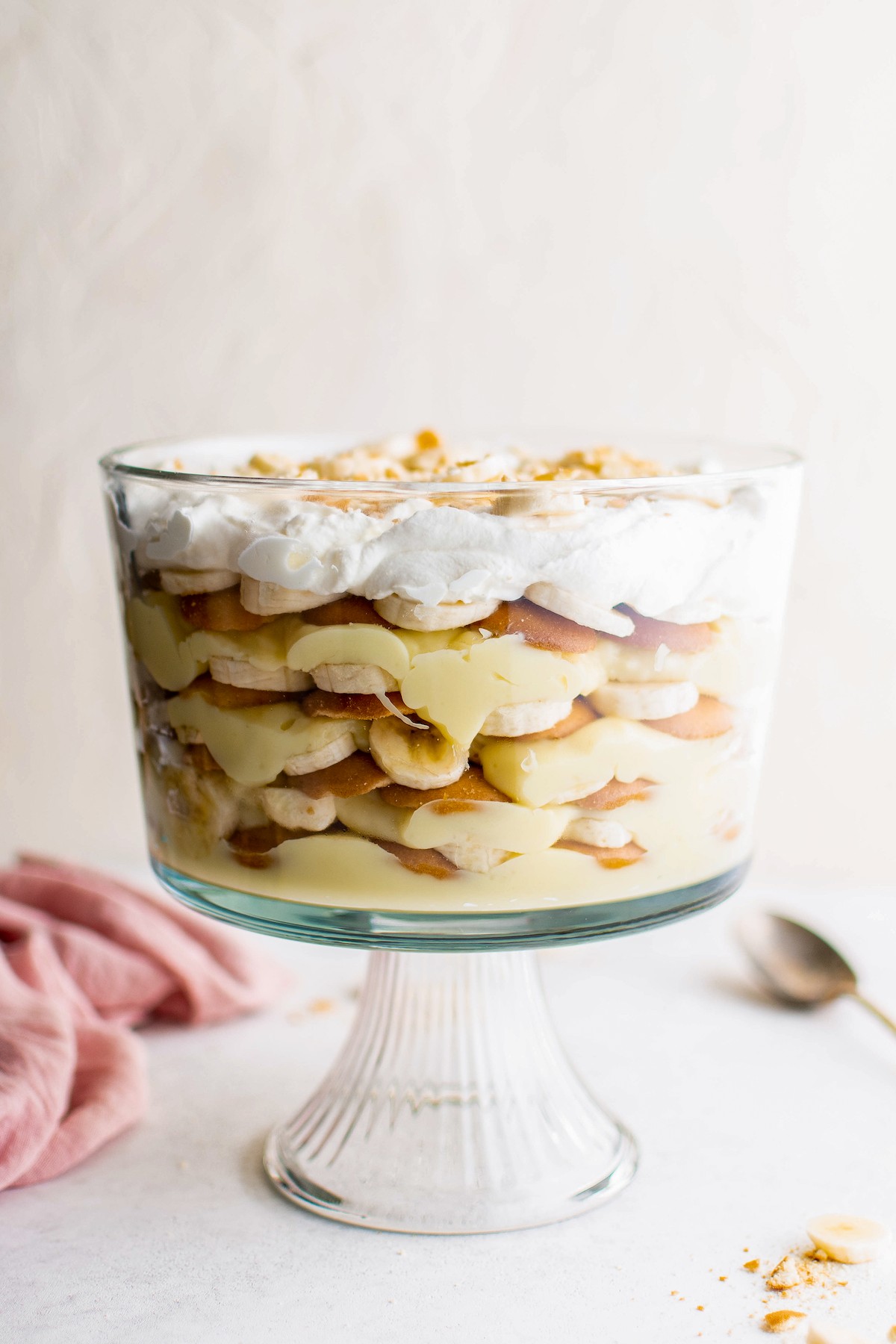 A layered banana pudding in a trifle dish.