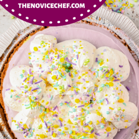 No bake cheesecake with whipped cream and sprinkles on top.