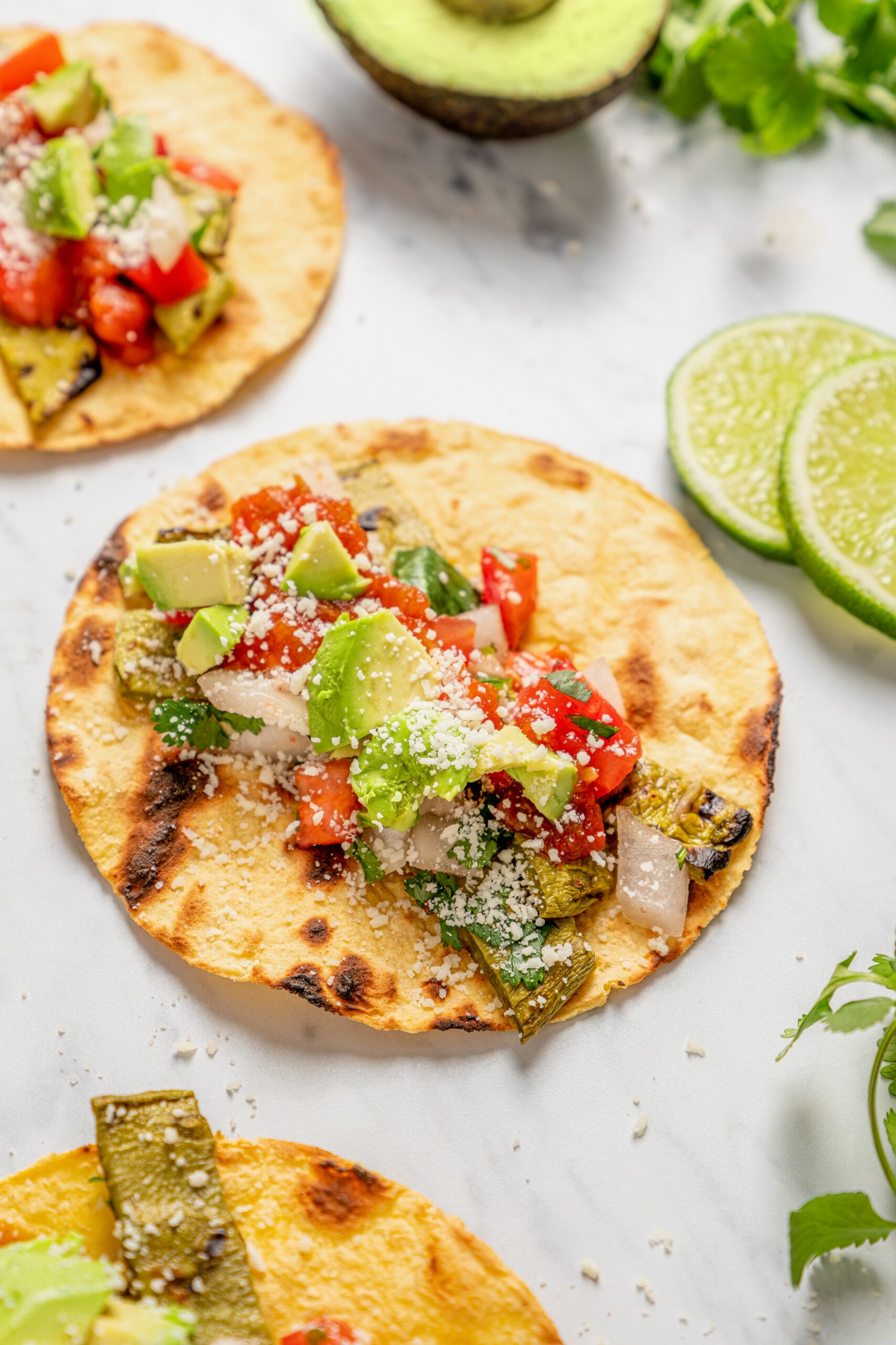 Close-up of a nopales tacos with toppings.