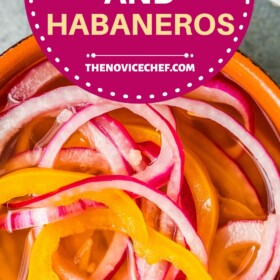 Pickled red onions and habanero peppers in a bowl.