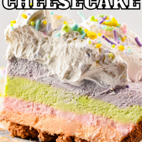 A slice of no bake cheesecake with rainbow colored layers.