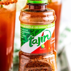 A container of Tajin seasoning without a lid.