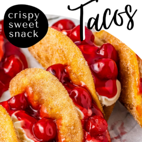 Cherry cheesecake tacos lined up against each other.
